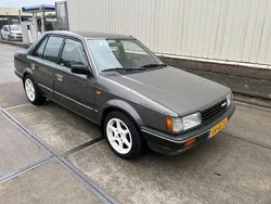 Grijs Gebruikt 1987 Mazda 323 | € 2.499