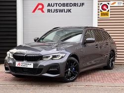 Grijs Gebruikt 2021 BMW 330e Executive Stationwagen | € 36.950 (Eerlijke prijs)