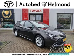 Bruin Gebruikt 2023 Toyota Corolla Hybrid Active Stationwagen | € 27.749