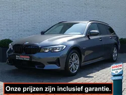Grijs Gebruikt 2022 BMW 330e Sport Line Stationwagen | € 29.900 (Goede deal)