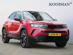 Rood, metallic lak Gebruikt 2024 Opel Mokka Ultimate SUV | € 27.945 (Eerlijke prijs)