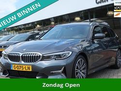 Grijs Gebruikt 2019 BMW 330 Executive Stationwagen | € 29.945 (Eerlijke prijs)