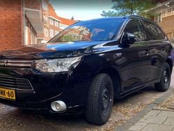 Zwart Gebruikt 2013 Mitsubishi Outlander P-HEV Instyle SUV | € 7.800 (Goede deal)