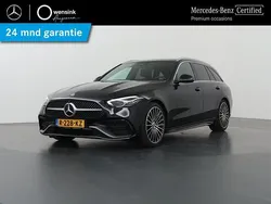 Zwart, metallic lak Gebruikt 2022 Mercedes C180 AMG line Stationwagen | € 39.850 (Iets duurder)