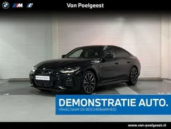 Zwart Gebruikt 2024 BMW i4 Executive Sedan | € 51.900 (Eerlijke prijs)