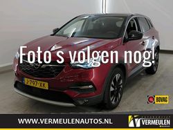 Rood (metallic) Gebruikt 2020 Opel Grandland X Business SUV | € 19.450 (Eerlijke prijs)