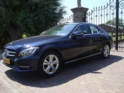 Blauw, metallic lak Gebruikt 2014 Mercedes C180 Elegance Sedan | € 17.250 (Eerlijke prijs)
