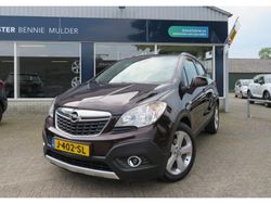 Bruin, metallic lak Gebruikt 2014 Opel Mokka Cosmo SUV | € 9.945 (Eerlijke prijs)