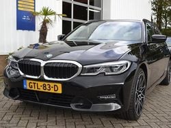 Zwart Gebruikt 2021 BMW 330 Executive Stationwagen | € 29.950 (Goede deal)