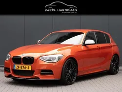 Oranje Gebruikt 2013 BMW M135 Executive Hatchback | € 19.950 (Eerlijke prijs)
