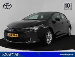 Grijs metallic Gebruikt 2023 Toyota Corolla Hybrid Active Hatchback | € 26.445 (Eerlijke prijs)