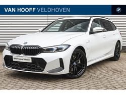 Wit Gebruikt 2024 BMW 330e Executive Stationwagen | € 49.950 (Eerlijke prijs)