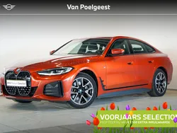 Sunset orange metallic (oranje metallic) Gebruikt 2023 BMW i4 Shadowline Sedan | € 43.495 (Super prijs)
