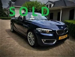 Blauw, metallic lak Gebruikt 2015 BMW 218 Luxury Line Cabriolet | € 22.950 (Duur)
