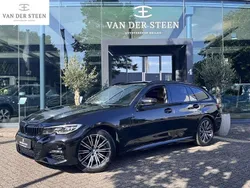Zwart, metallic lak Gebruikt 2022 BMW 320e Executive Stationwagen | € 34.950 (Super prijs)