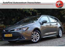 Bruin Gebruikt 2023 Toyota Corolla Hybrid Active Stationwagen | € 23.400 (Goede deal)