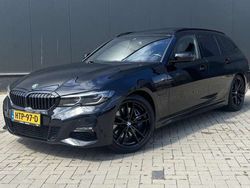 Zwart Gebruikt 2022 BMW 330e Stationwagen | € 40.950 (Eerlijke prijs)