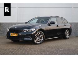 Zwart Gebruikt 2021 BMW 330 Stationwagen | € 25.845 (Goede deal)