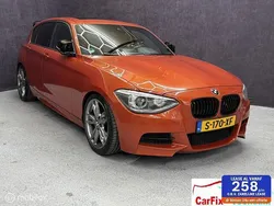 Oranje Gebruikt 2013 BMW M135 M Sport Hatchback | € 15.950