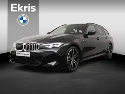 Zwart Gebruikt 2024 BMW 320e Comfort Edition Stationwagen | € 45.900 (Eerlijke prijs)