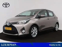 Bruin Gebruikt 2015 Toyota Yaris Hybrid Hatchback | € 14.445 (Eerlijke prijs)