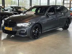 Grijs Gebruikt 2022 BMW 320e M Sport Stationwagen | € 25.490 (Goede deal)