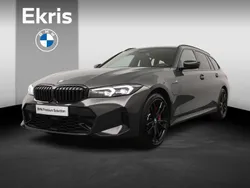 Dravitgrau Gebruikt 2024 BMW 330e Basis Stationwagen | € 58.950 (Iets duurder)
