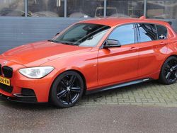 Oranje Gebruikt 2015 BMW 116 Executive Hatchback | € 10.949
