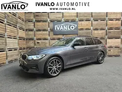 Grijs, metallic lak Gebruikt 2021 BMW 330e Executive Stationwagen | € 32.950 (Eerlijke prijs)