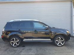 Zwart, metallic lak Gebruikt 2009 Mitsubishi Outlander SUV | € 9.950 (Iets duurder)