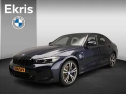 Donker tansanit blauw metallic Gebruikt 2024 BMW 320e Shadowline Sedan | € 52.900 (Duur)
