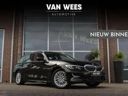 Zwart Gebruikt 2022 BMW 320e Executive Stationwagen | € 34.950 (Super prijs)