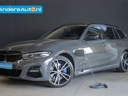 Grijs Gebruikt 2022 BMW 330e Executive Stationwagen | € 42.995 (Eerlijke prijs)