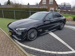 Zwart, metallic lak Gebruikt 2022 Mercedes C180 AMG line Sedan | € 52.500