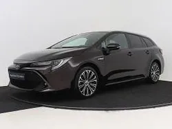 Bruin Gebruikt 2021 Toyota Corolla Executive Stationwagen | € 26.495 (Eerlijke prijs)
