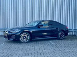 Zwart Gebruikt 2024 BMW i4 Executive Sedan | € 45.900 (Super prijs)