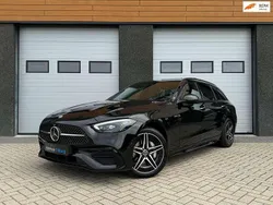 Zwart Gebruikt 2022 Mercedes C300e AMG Stationwagen | € 41.990 (Eerlijke prijs)