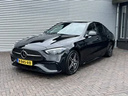 Zwart Gebruikt 2022 Mercedes C200 AMG line Sedan | € 42.900 (Goede deal)