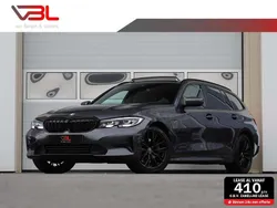 Grijs Gebruikt 2022 BMW 320e Executive Stationwagen | € 30.940 (Super prijs)