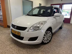 Wit, metallic lak Gebruikt 2014 Suzuki Swift Hatchback | € 7.699 (Eerlijke prijs)