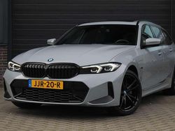 Grijs Gebruikt 2023 BMW 330e M Sport Stationwagen | € 43.995 (Eerlijke prijs)