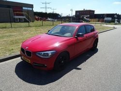 Rood Gebruikt 2015 BMW 118 Executive Hatchback | € 6.995 (Goede deal)