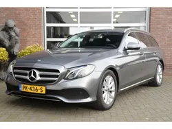 Grijs, metallic lak Gebruikt 2017 Mercedes E200 Business Stationwagen | € 19.950 (Goede deal)