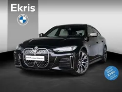 Zwart, metallic lak Gebruikt 2023 BMW i4 Comfort Edition Sedan | € 54.895 (Eerlijke prijs)
