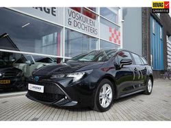 Zwart Gebruikt 2022 Toyota Corolla Hybrid Comfort Stationwagen | € 23.950 (Eerlijke prijs)