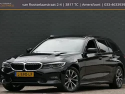 Zwart Gebruikt 2021 BMW 320e Shadowline Stationwagen | € 28.850 (Eerlijke prijs)