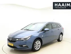 Blauw, metallic lak Gebruikt 2016 Opel Astra Innovation Stationwagen | € 15.450 (Eerlijke prijs)