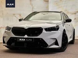 Grijs, metallic lak Gebruikt 2025 BMW M5 Shadowline Stationwagen | € 172.950