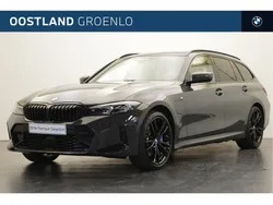 Dravitgrau (grijs metallic) Gebruikt 2024 BMW 330e Comfort Edition Stationwagen | € 53.950 (Goede deal)