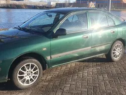 Groen Gebruikt 2000 Mitsubishi Carisma Hatchback | € 995